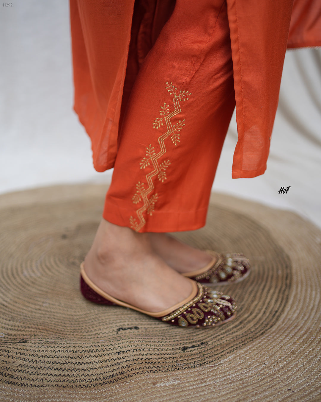 MyHof Rust Orange Hand Embroidery Suit Set In Muslin